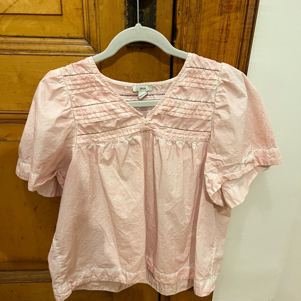 Anthropologie top, small holes around sleeves from safety pins